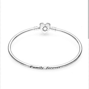 Pandora Bangle in Sterling Silver with Heart-Shaped Clasp. Size: 17cm
